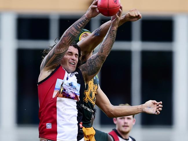 Southern Districts' Matt Cannard grabs a mark. Picture: Keri Megelus