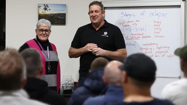 Ex Melbourne footballer David Schwarz and Sheryl Brett, general manager and head nurse, talking to addicts (alcoholics, drug addicts and gamblers) who attend MyHab, an addicts anonymous group in Glen Waverley. Picture: Michael Klein