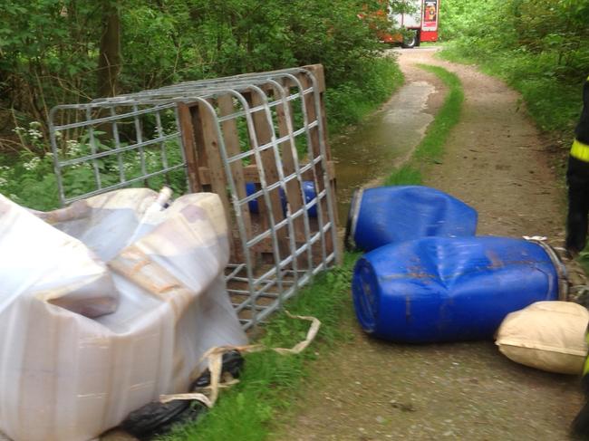 Dump and run: These plastic barrels and tank appear to have been recklessly pushed off the back of a truck. Drug manufacturers are destroying the forests of Dutch province of Brabant in the Netherlands