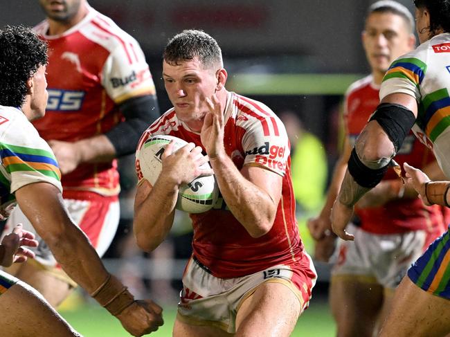 BRISBANE, AUSTRALIA - MARCH 11: Tom Gilbert of the Dolphins takes on the defence during the round two NRL match between the Dolphins and the Canberra Raiders at Kayo Stadium on March 11, 2023 in Brisbane, Australia. (Photo by Bradley Kanaris/Getty Images)