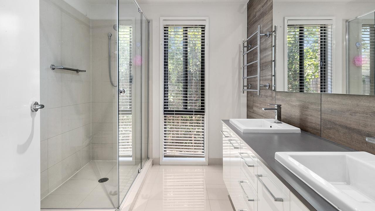 The ensuite has a double vanity and large shower.