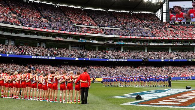 Sydney and the Western Bulldogs line-up before the AFL Grand Final.