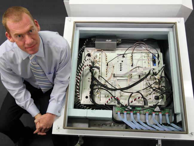 Professor Steven Tingay at the International Centre for Radio Astronomy Research, Curtin University in Perth, with major pieces of a revolutionary new radio telescope that have been built for the Murchison Wide-field Array in 2011.