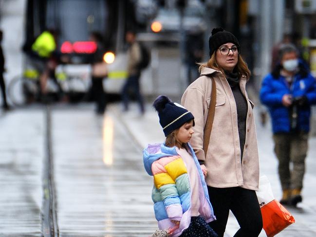 MELBOURNE, AUSTRALIA - NewsWire Photos JULY 18, 2022: Photo of people are seen walking in MelbourneÃs CBDPicture: NCA NewsWire / Luis Enrique Ascui