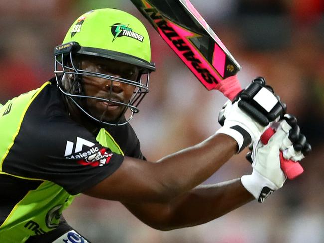 Thunder's Andre Russell cuts for a boundary during the BBL T20 game between the Sydney Thunder and the Brisbane Heat at Spotless Stadium,Homebush .Picture : Gregg Porteous