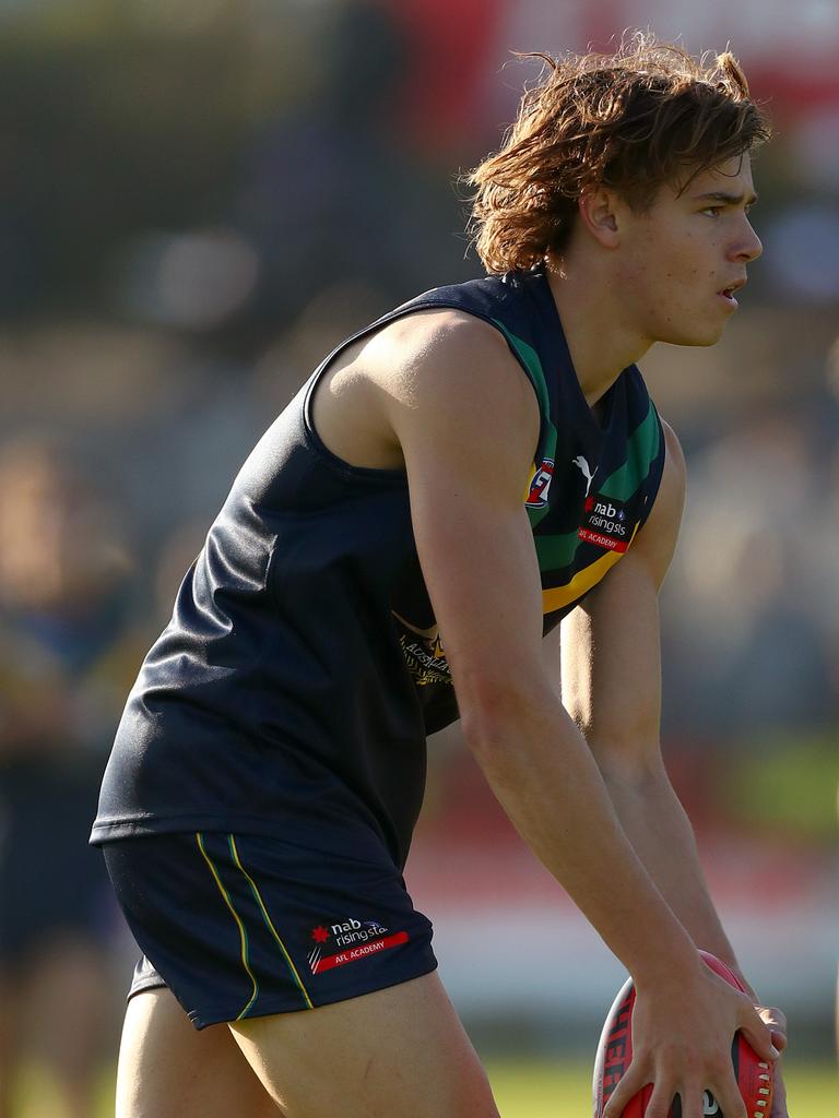 Aaron Cadman kicks on goal. Picture: Kelly Defina/AFL Photos/Getty Images