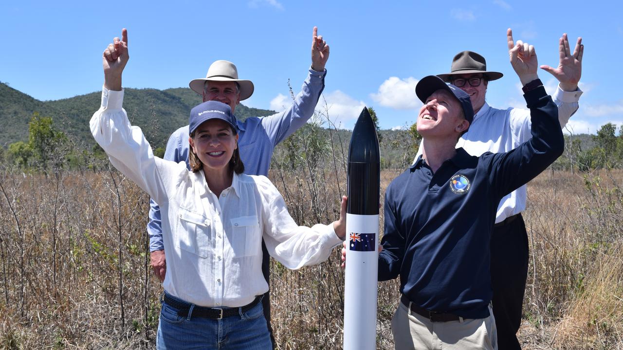 (From left) LNP Leader Deb Frecklington, Member for Burdekin Dale Last, Member for Dawson George Christensen and Gilmour Space Technologies co-founder and CEO Adam Gilmour with a replica rocket. The real thing will be 23m tall. Photo: Elyse Wurm