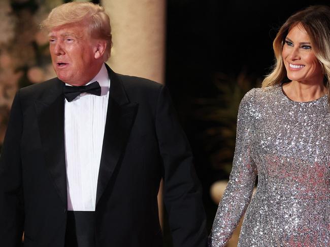 PALM BEACH, FLORIDA - DECEMBER 31: Former U.S. President Donald Trump and former first lady Melania Trump arrive for a New Years event at his Mar-a-Lago home on December 31, 2022 in Palm Beach, Florida. Trump continues to run for a second term as the President of the United States.   Joe Raedle/Getty Images/AFP (Photo by JOE RAEDLE / GETTY IMAGES NORTH AMERICA / Getty Images via AFP)