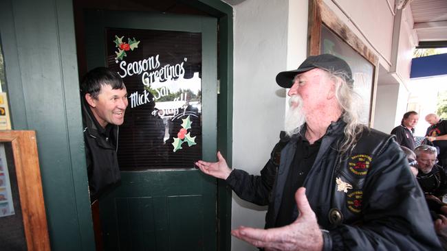 Descendants bikie Tom Mackie knocks on the door of the Macclesfield Hotel as hundreds of bikers were locked out during the United Motorcycle Council protest ride in 2009. They were unsuccessfully fighting the State Government’s anti-association laws.