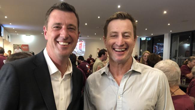 The victorious winning independent candidate in Wakehurst, Michael Regan, with friend and supporter Steve Menzies, former Manly Sea Eagles great, at the Manly Warringah Football Club at Cromer after grabbing the safe seat from the Liberals. Picture: Jim O'Rourke