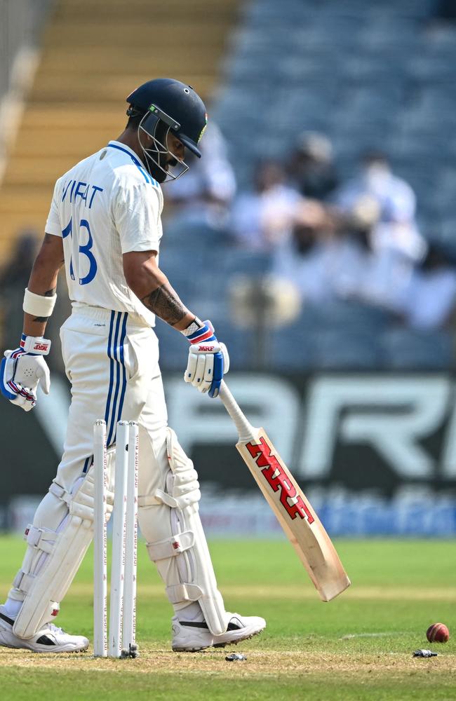 Virat Kohli trudges off after falling to a full toss. Picture: Punit Paranjpe/AFP