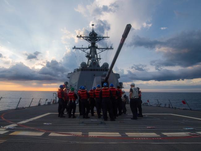 The USS Dewey sailed in disputed South China Sea waters near a reef claimed by Beijing last week in a “freedom of navigation operation” Washington said. Picture: US Navy/AFP