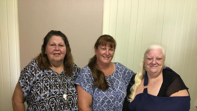 Leanne Long and Kerry Clarke from Vinnies offered assistance to Glynis Limberg (middle) after two bushfires ravaged her farm in December.