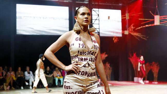 Sarah Eggmolesse models the Yarrabah Affirmations collection by the Yarrabah Arts & Culture Precinct at the Cairns Indigenous Art Fair fashion performance, Woven, held at the Tanks Arts Centre, Edge Hill. Picture: Brendan Radke