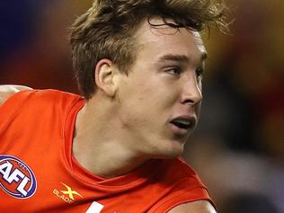 AFL Round 6. North Melbourne vs Gold Coast Suns at Etihad Stadium.  Gold Coast Suns' Tom Lynch turns North Melbourne's Robbie Tarrant inside out    . Pic: Michael Klein