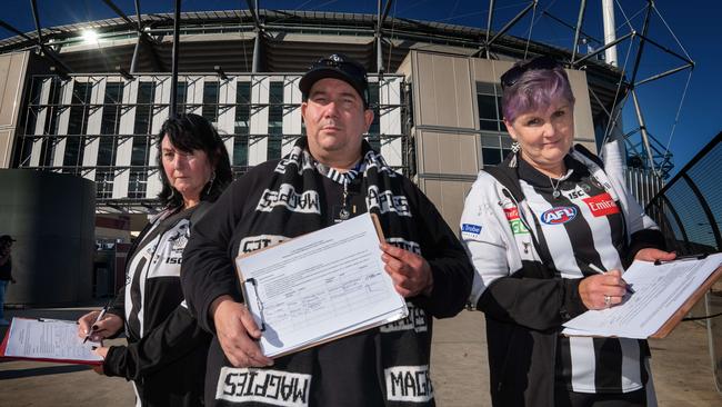 Collingwood petition organiser David Hatley (centre), with members Colleen Riding and Maxine Willis. Picture: Tony Gough