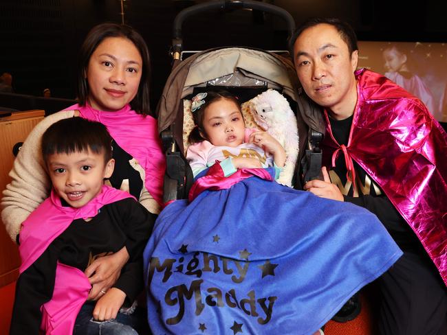 Maddy Suy with her mum Truc, dad Alan and brother Jamison, at the NSW Art Gallery for the screening of Mighty Maddy's Mission to the Future film. Picture: Tim Hunter