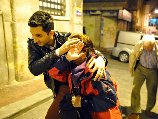 Attacks ... the attack allegedly targeted German tourists in the historic Sultanahmet district. They were escorted back to their hotel in Istanbul after the attack. Picture: AP Photo/Omer Kuscu