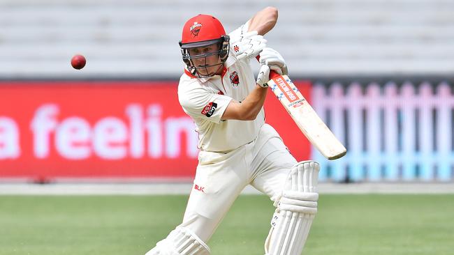 Redback Henry Hunt drives on his way to his maiden first class century. Picture: Mark Brake/Getty Images