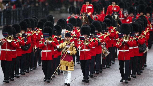 The band of the Irish Guards leave Buckingham Palace to parade down The Mall during the King's Birthday Parade. Picture: AFP.