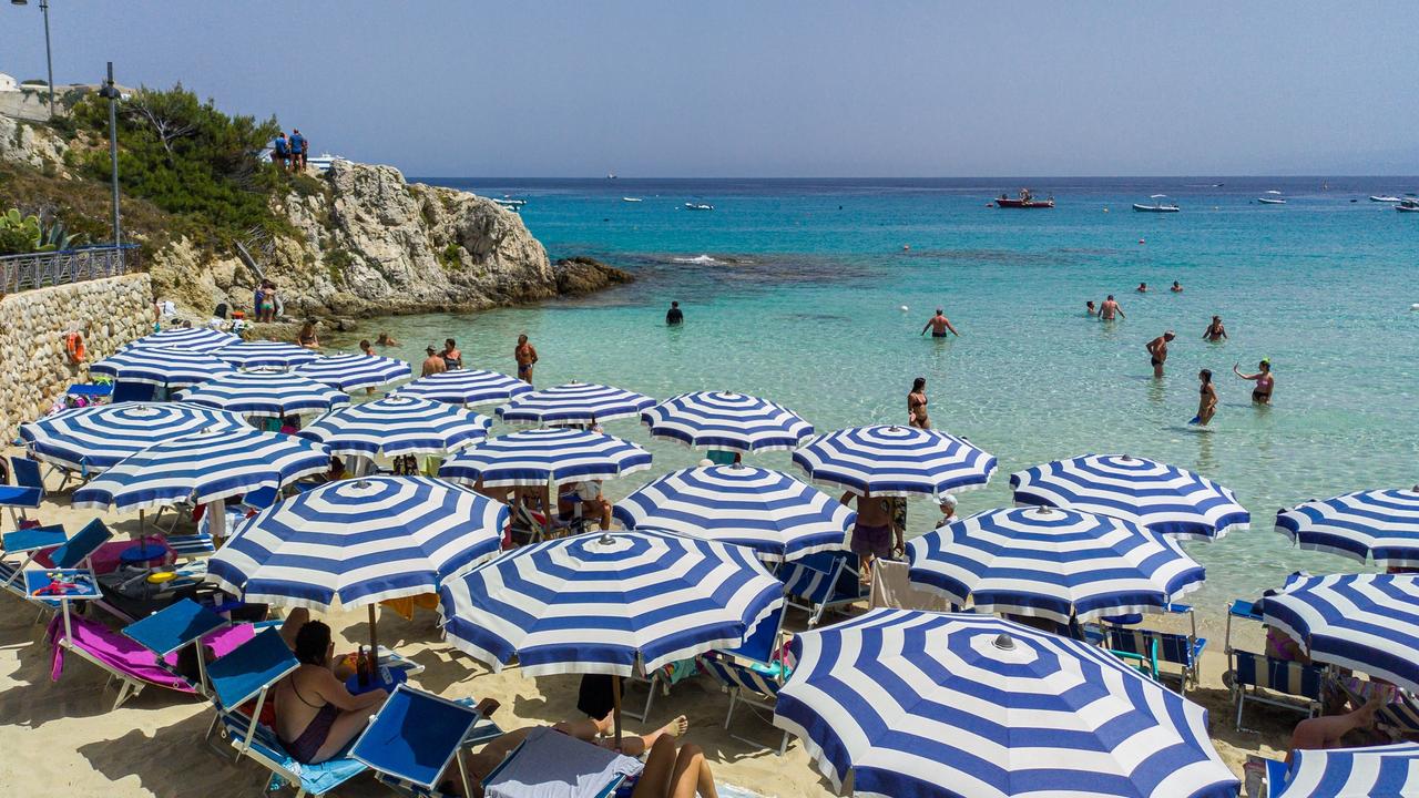 Many beaches in Italy charge tourists to hire parasols and sunlounges. Picture: istock