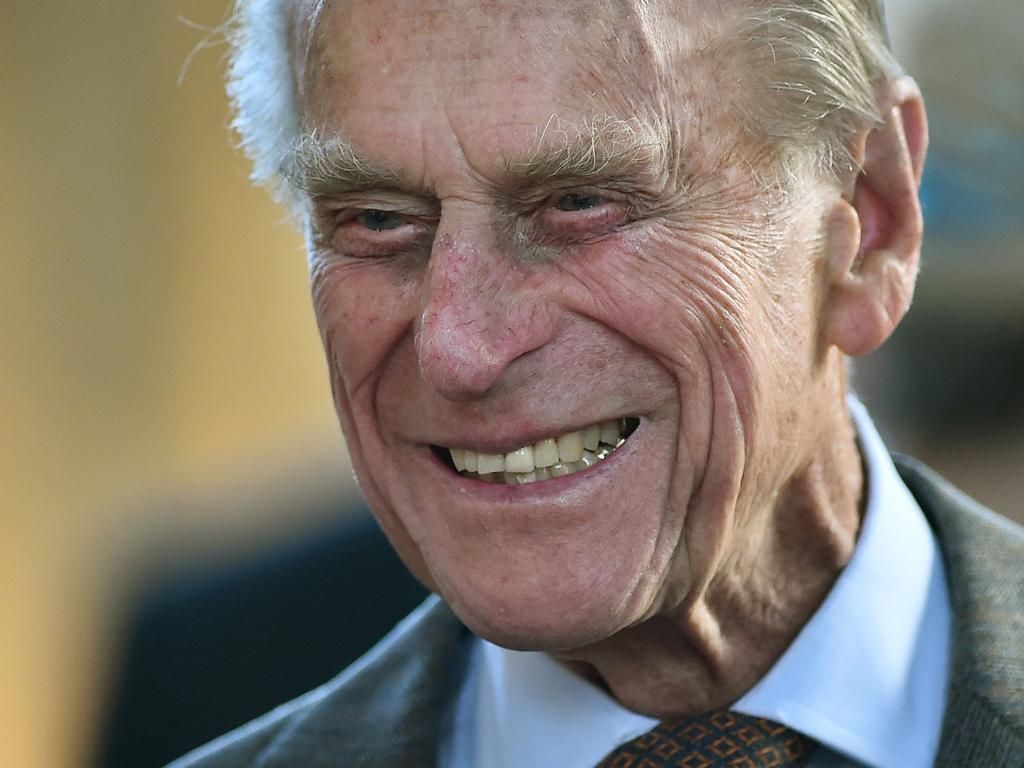 2014: Britain's Prince Philip, Duke of Edinburgh smiles as he meets members of the Royal College of Organists to commemorate their 150th anniversary at St. George's chapel at Windsor Castle in Windsor west of London on April 9, 2014. Picture: Ben STANSALL / POOL / AFP