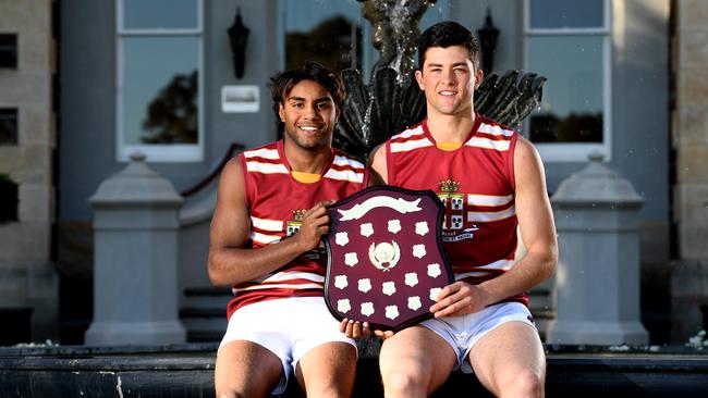 Prince Alfred College stars Kysaiah Pickett (L) and captain Karl Finlay led their team to a third consecutive college football Messenger Shield title. Picture: Tricia Watkinson