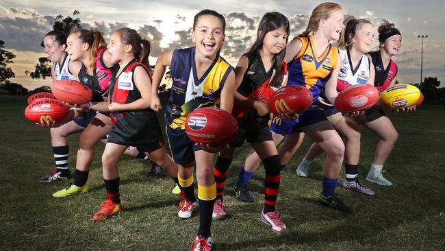 Young AFL hopefuls (from left) Madison 17, Teagan 13, Tamieka 8, Makayla 10, Kallila 8, Shaneece 14, Sharni 13, and Erin 14. Picture: Alex Coppel.