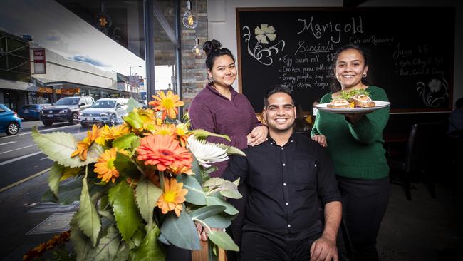 Anshu Bisht, Rohit Kumar and Jyoti Janoti have opened Marigold Cafe in North Hobart. Picture: LUKE BOWDEN