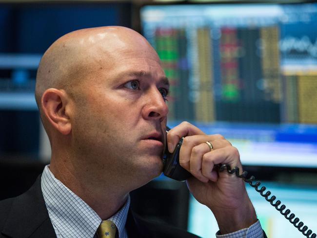 NEW YORK, NY - NOVEMBER 02: A trader works on the floor of the New York Stock Exchange on November 2, 2015 in New York City. After the opening bell this morning Hewlett Packard officially split into two companies, Hewlett-Packard Enterprise, focused on businesses and HP, Inc, focused on consumers. Andrew Burton/Getty Images/AFP == FOR NEWSPAPERS, INTERNET, TELCOS & TELEVISION USE ONLY ==