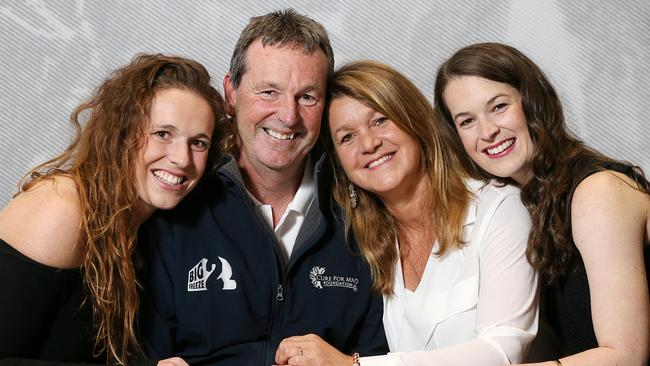 Neale Daniher with his wife, Jan, and two of their four children, Bec and Lauren.