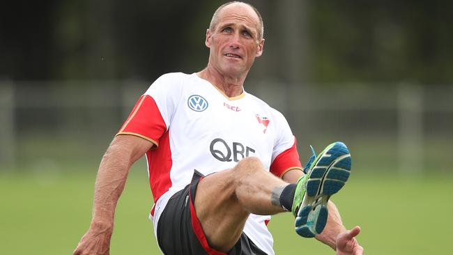 Tony Lockett having a kick at Sydney training. Picture: Phil Hillyard