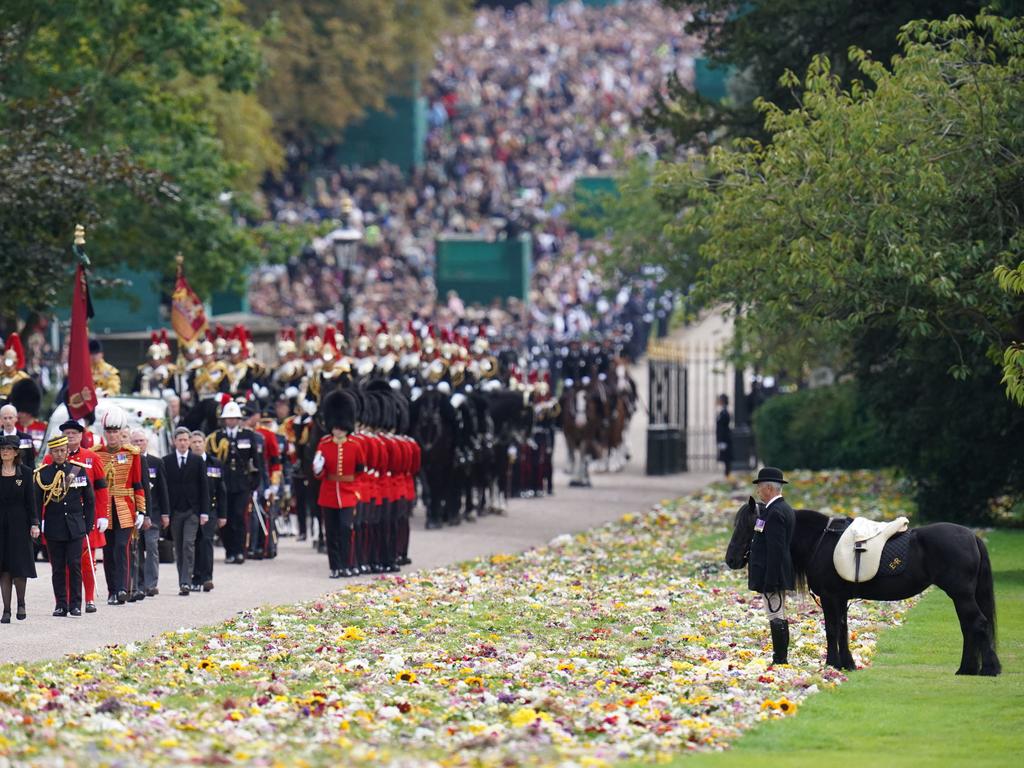 The Queen’s funeral procession going past the monarch’s beloved Fell pony, Emma. Picture: AFP