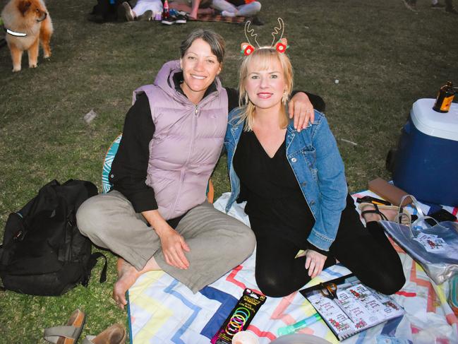 Sierra Dunton and Brianna Everingham getting festive at the Phillip Island Christmas Carols by the Bay at the Cowes Foreshore on Tuesday, December 10, 2024. Picture: Jack Colantuono