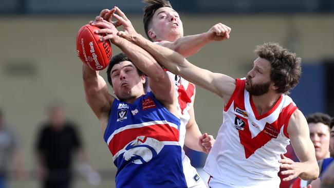 Matt Polkinghorne marks for Wandin. Picture: Stuart Milligan