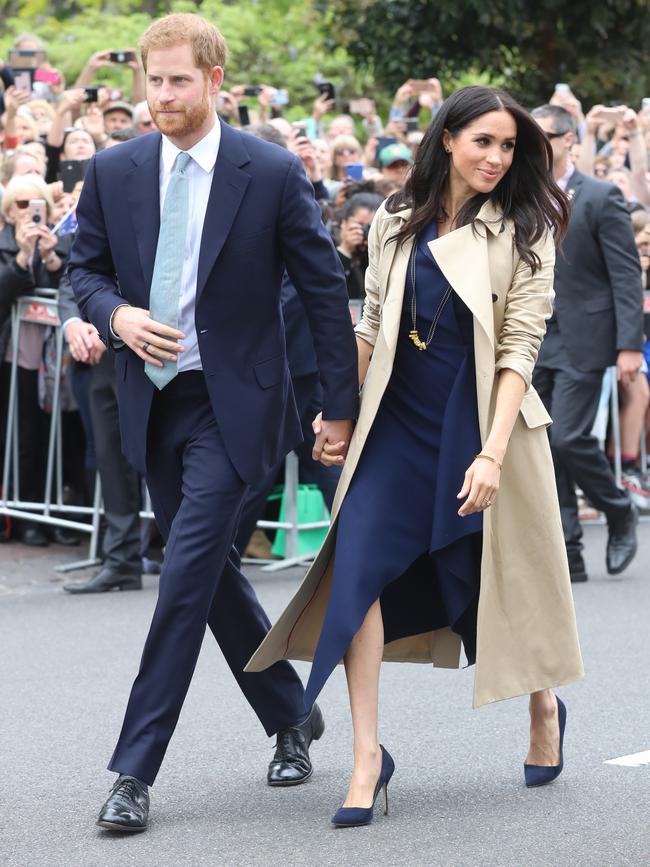 Harry and Meghan meet the crowd before entering Government House. Picture: Alex Coppel