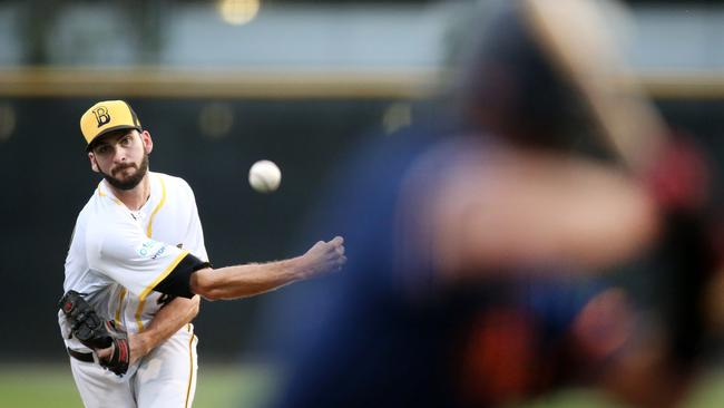 Sam Holland pitching for the Brisbane Bandits against Adelaide Bite.