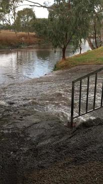 Rain rushes into the Condamine River