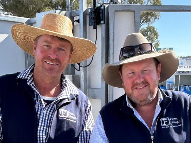 Bob Thornely and Simon Flinn of Flinn Designs at The Rock in southern NSW win the Henty Machinery Field Days Machine of the Year award with their ergonomically designed automated catching pen.  Picture: Nikki Reynolds