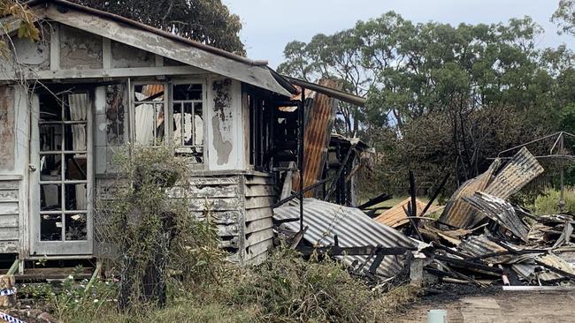 Photos show the burned out Urangan home after it was destroyed by fire on Sunday morning.