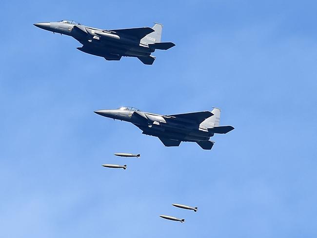 South Korea's F-15K fighter jets drop bombs during a training at the Taebaek Pilsung Firing Range on Ain Gangwon-do, South Korea. Picture: Getty