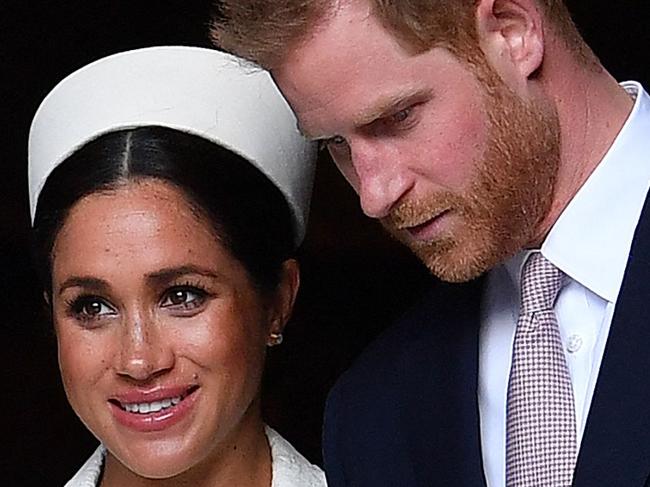 (FILES) In this file photo taken on March 11, 2019 Britain's Prince Harry, Duke of Sussex (R) and Meghan, Duchess of Sussex leave after attending a Commonwealth Day Service at Westminster Abbey in central London. - Prince Harry will produce a documentary about the Invictus Games for disabled military veterans -- the first series under a lucrative deal he and  wife Meghan Markle signed with Netflix after moving to California last year.  Harry, who served with the British military in Afghanistan, will appear on camera and executive-produce "Heart of Invictus," a multi-episode series which follows competitors as they train for next spring's competition in The Hague. (Photo by Ben STANSALL / AFP)