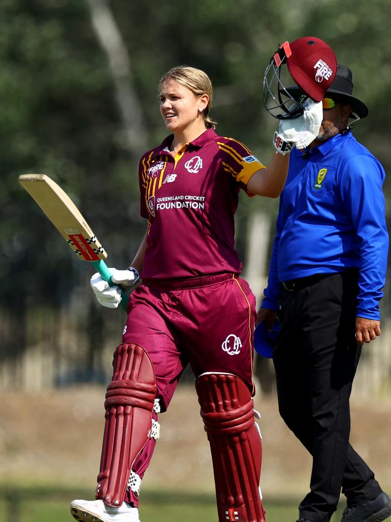 Georgia Voll of Queensland celebrates her century during the WNCL match between ACT and Queensland. Photo: Mark Nolan/Getty Images