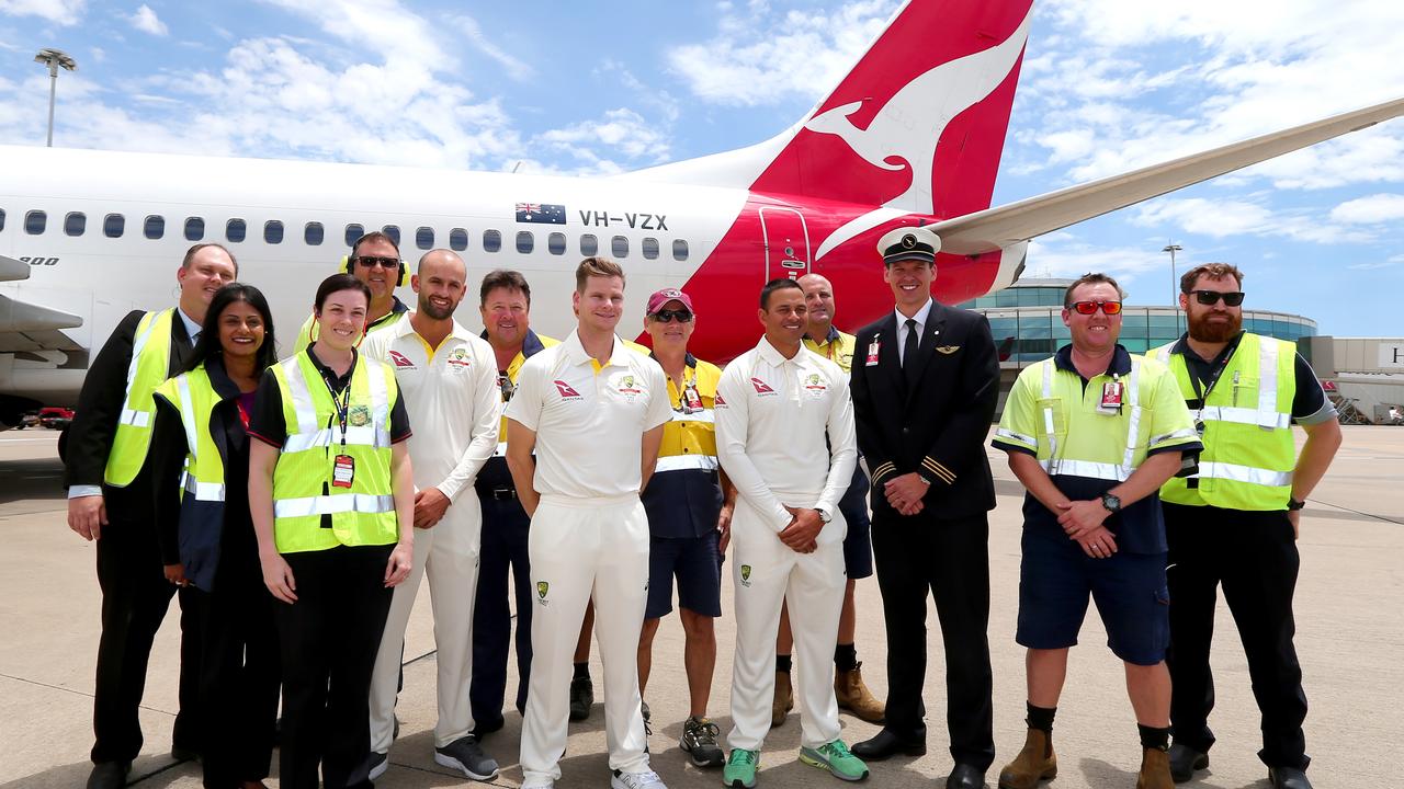 Nathan Lyon, Steve Smith and Usman Khawaja with airline staff in 2017.