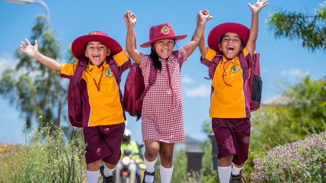 Triplets Arav, Abia and Sahib Suman, 5, get ready to start prep in Mernda. Picture: Jason Edwards