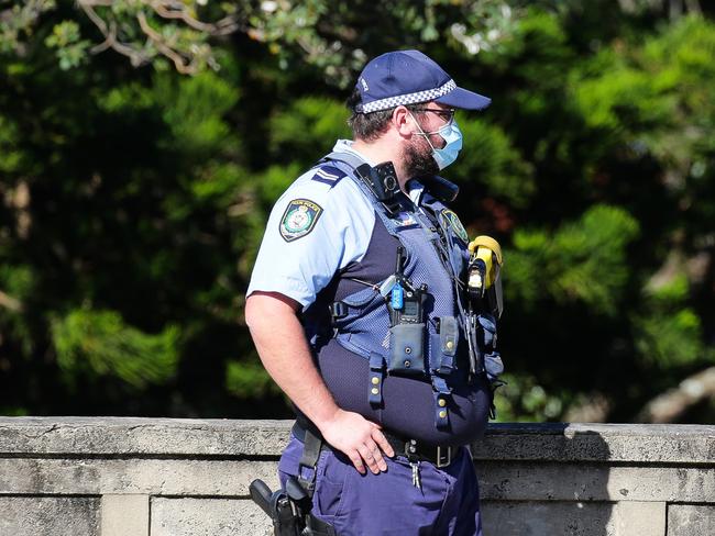 SYDNEY, AUSTRALIA - Newswire Photos AUGUST 10, 2021: Police seen at Bondi Beah patrolling the area after the Public School is closed after a student tests positive to COVID-19. The NSW Department of Education said Bondi Beach Public School would be closed for cleaning and contact tracing after the student's positive test result in Sydney. Picture: NCA Newswire /Gaye Gerard