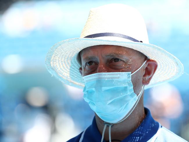 A security guard wearing a face mask looks on Rod Laver Arena during day two of the 2021 Australian Open at Melbourne Park. Picture: Getty Images