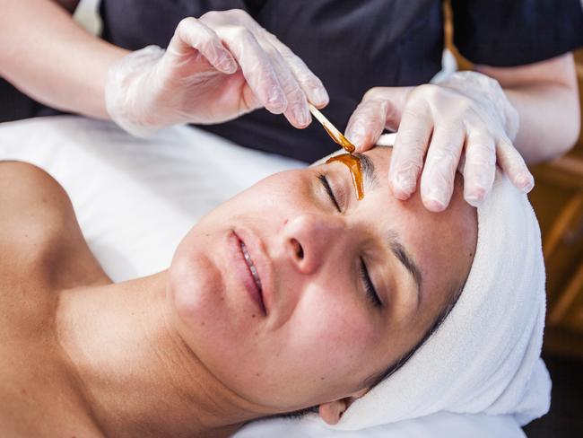 Woman Getting Her Eyebrows Waxed