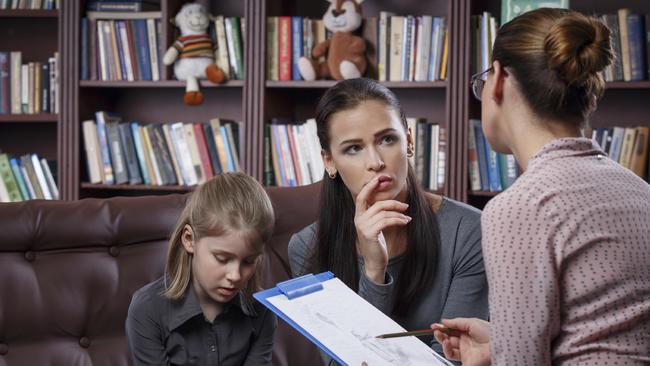 RendezView. Young mom with her daugher at psychologist consultation.