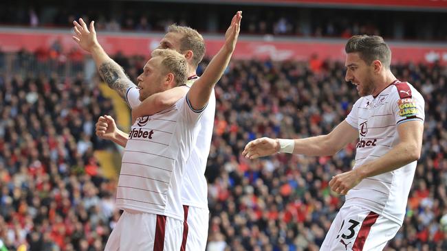 Burnley's Scott Arfield , left, celebrates.